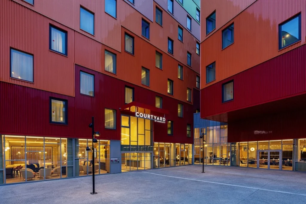 Modern exterior of Courtyard by Marriott Paris Charles de Gaulle Central Airport near Paris Charles de Gaulle Airport.