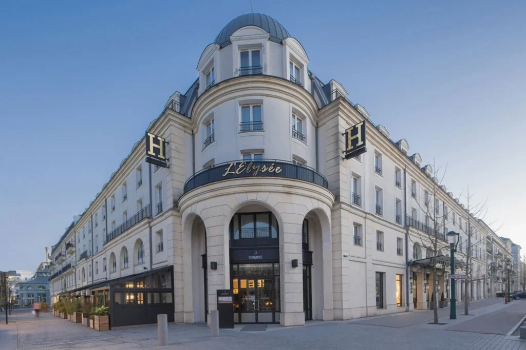 Elegant exterior of Hôtel l’Elysée Val d’Europe near Disneyland Paris.