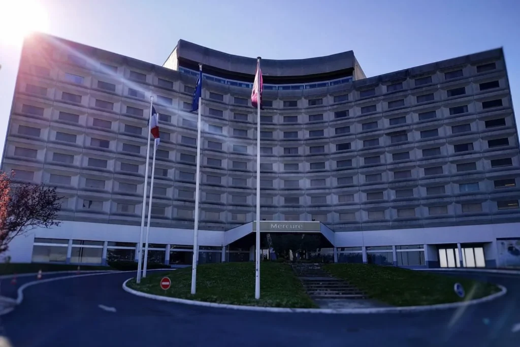 Hotel Facade, main entrance and front drive at Mercure Paris CDG Airport & Convention