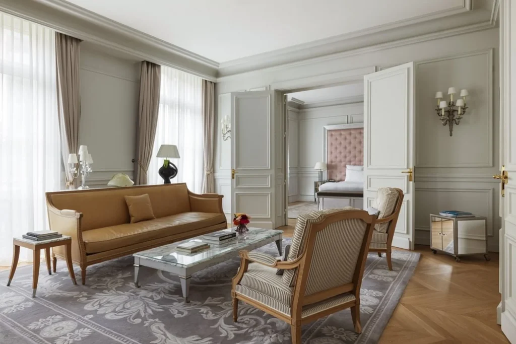 Elegant luxury suite living room with classic furnishings at Royal Monceau – Raffles Paris
